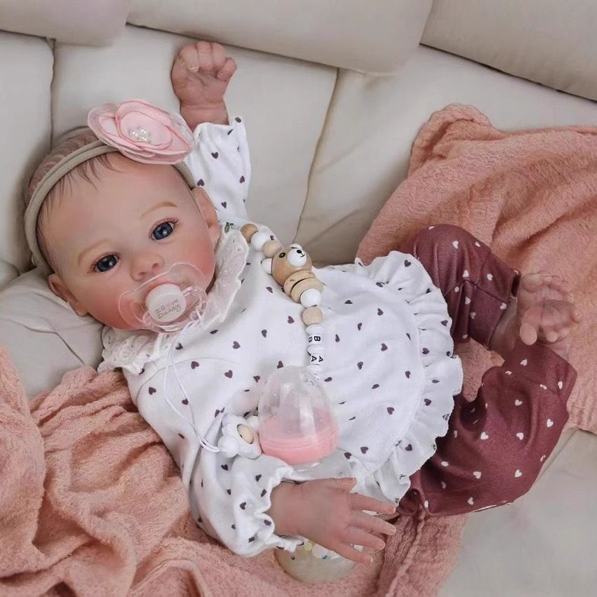 18-inch silicone reborn doll, high-quality replica of a baby, simulated veins, and high-color painted hair