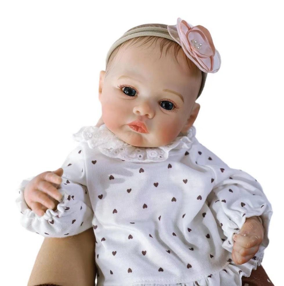 18-inch silicone reborn doll, high-quality replica of a baby, simulated veins, and high-color painted hair