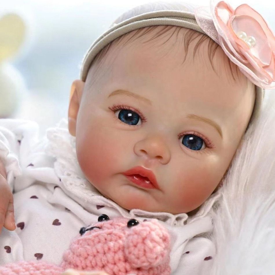 18-inch silicone reborn doll, high-quality replica of a baby, simulated veins, and high-color painted hair