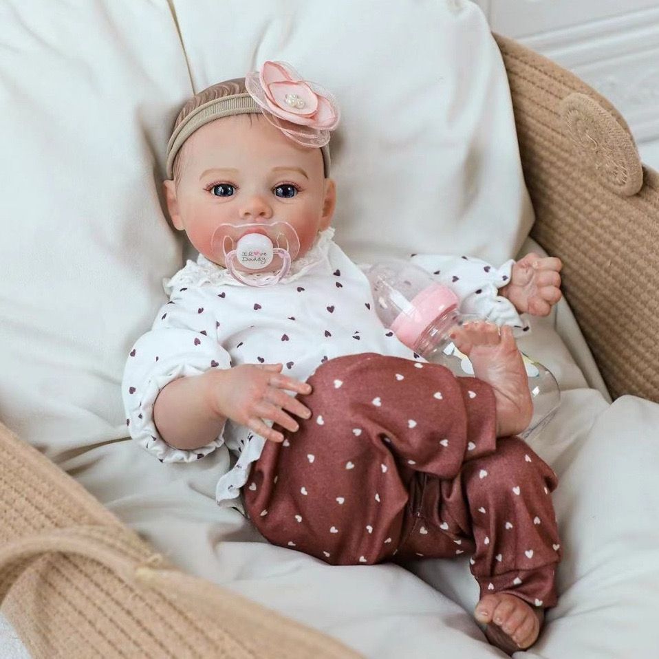 18-inch silicone reborn doll, high-quality replica of a baby, simulated veins, and high-color painted hair